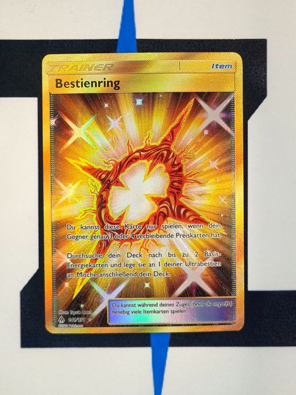    pokemon-karte-bestienring-gold-rare-grauen-der-lichtfinsternis-141-deutsc